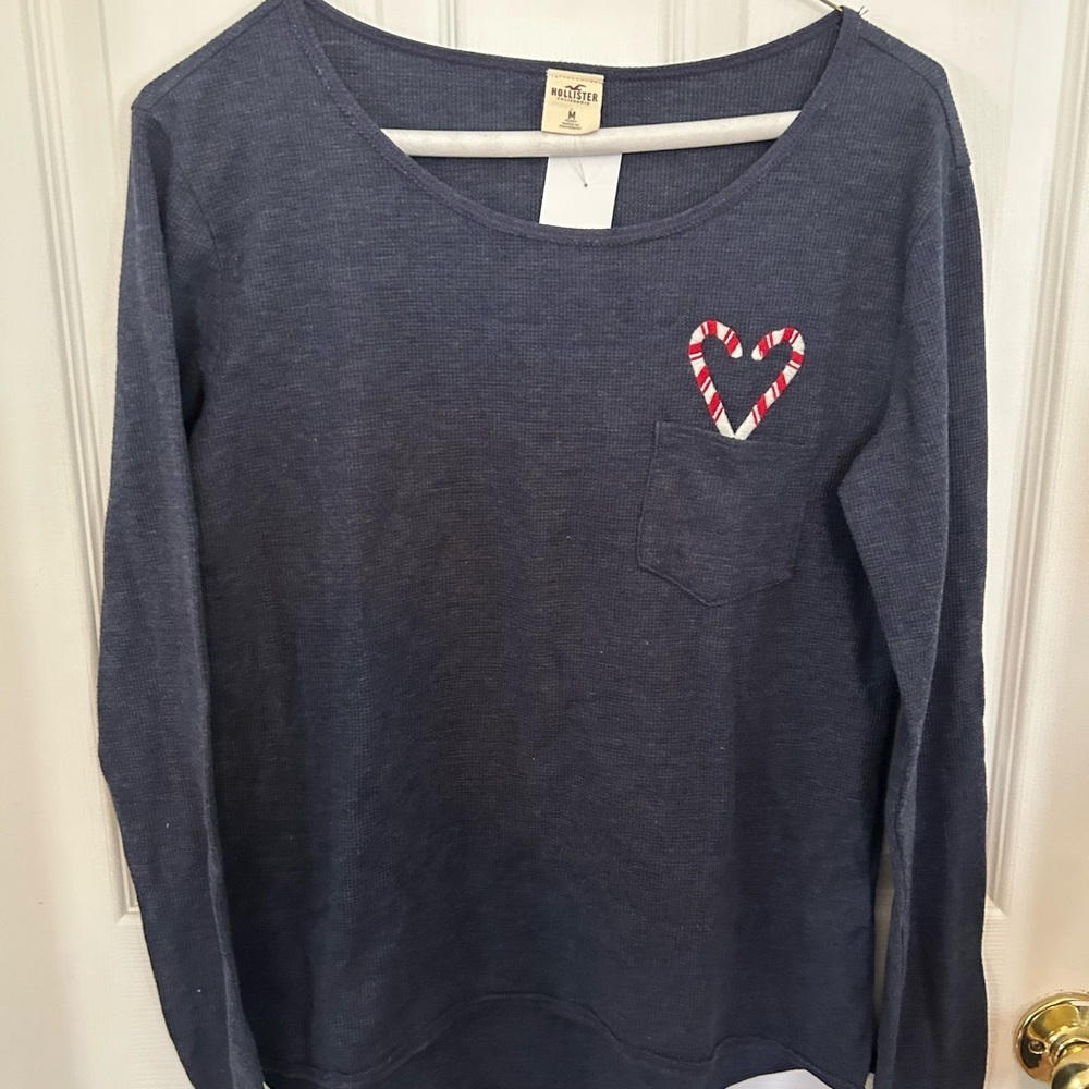 Hollister navy blue long sleeve top with candy cane design